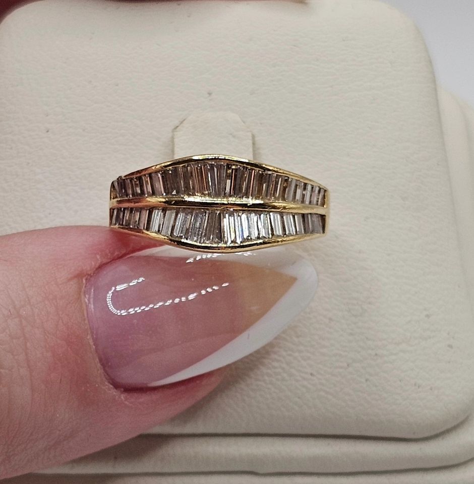 18k yellow gold custom ring with 30 baguette cut diamonds