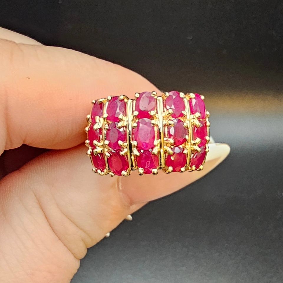10k Gold Ring set with 15 vibrant Rubies totaling 4.13 carats