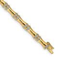 Bamboo-style 14k Gold Diamond bracelet in polished yellow gold, with repeating tapered links and pavé-set accents.