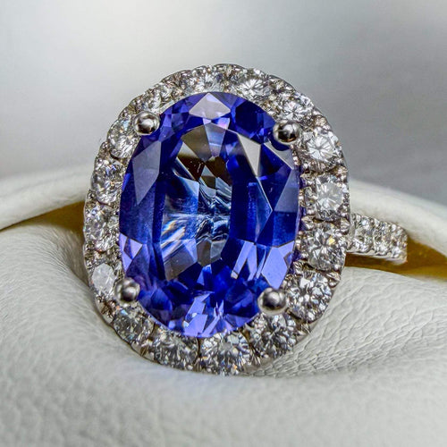 18kt white gold tanzanite and diamond engagement ring with bright polished finish by Custom Jewellers by Gianni