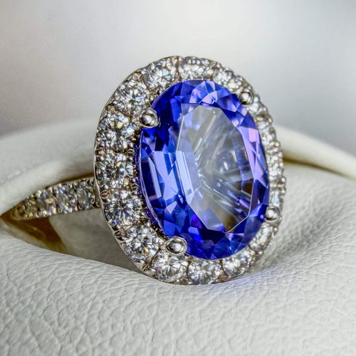 18kt white gold tanzanite and diamond engagement ring with bright polished finish by Custom Jewellers by Gianni