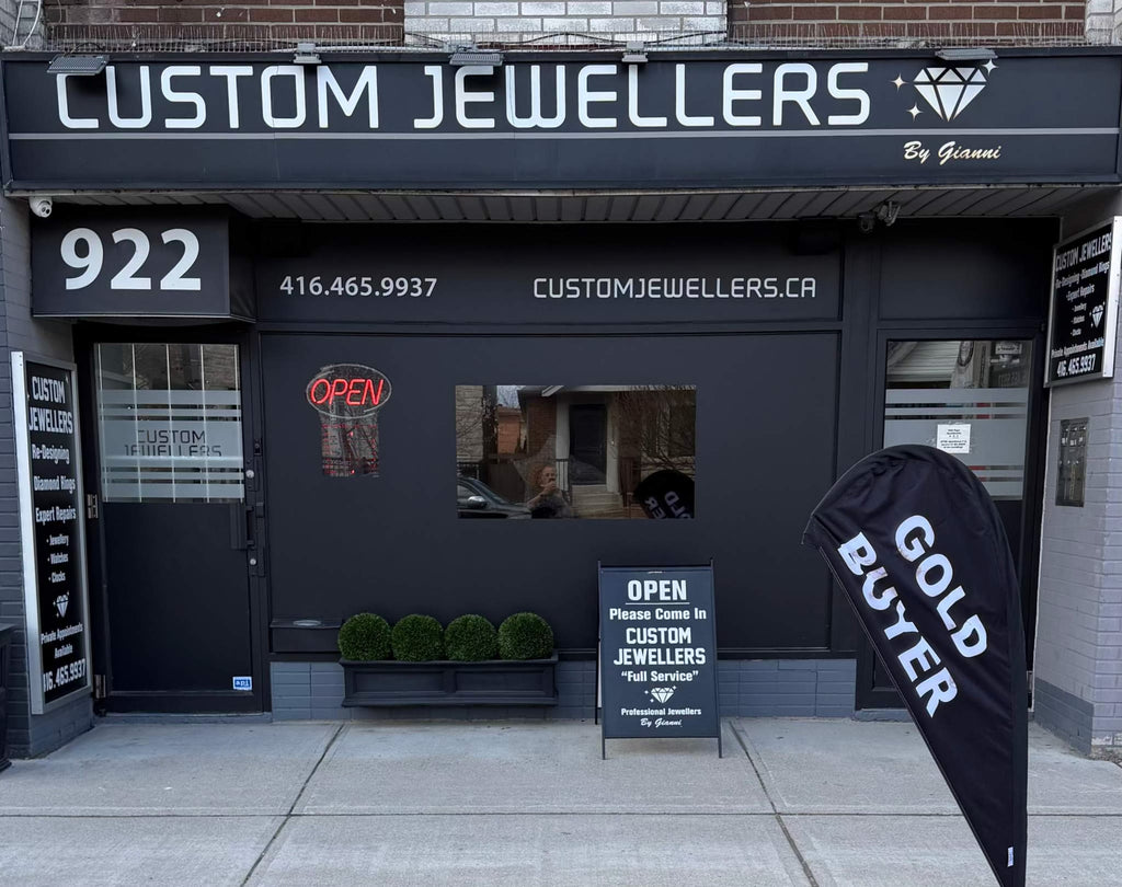 Custom Jewellers storefront with contact information and promotional sign.