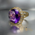 14k yellow gold ring with oval natural amethyst and partial-halo crescent moon diamonds