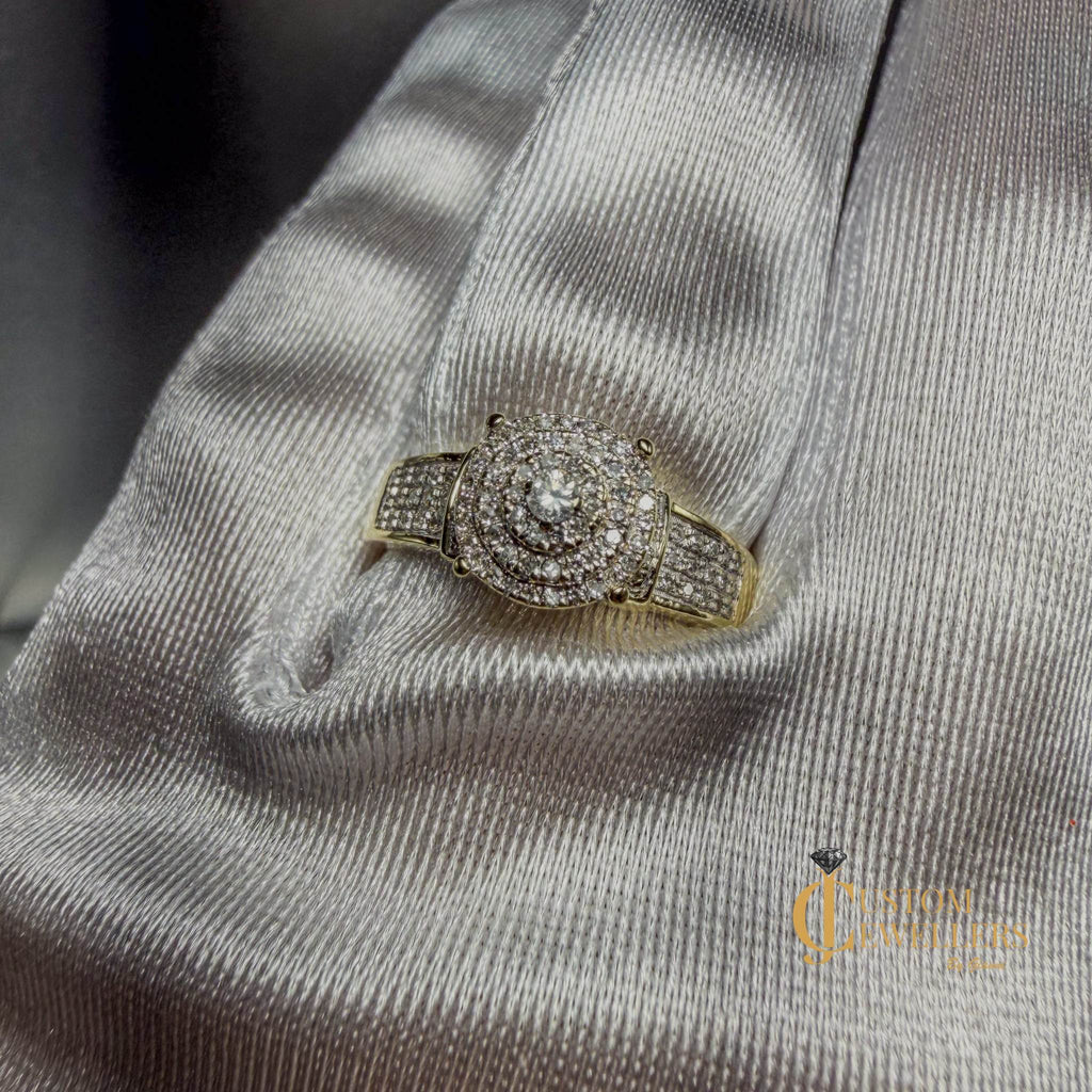 Hand assembled diamond custom cluster ring in 10k yellow gold with nearly 100 sparkling diamonds