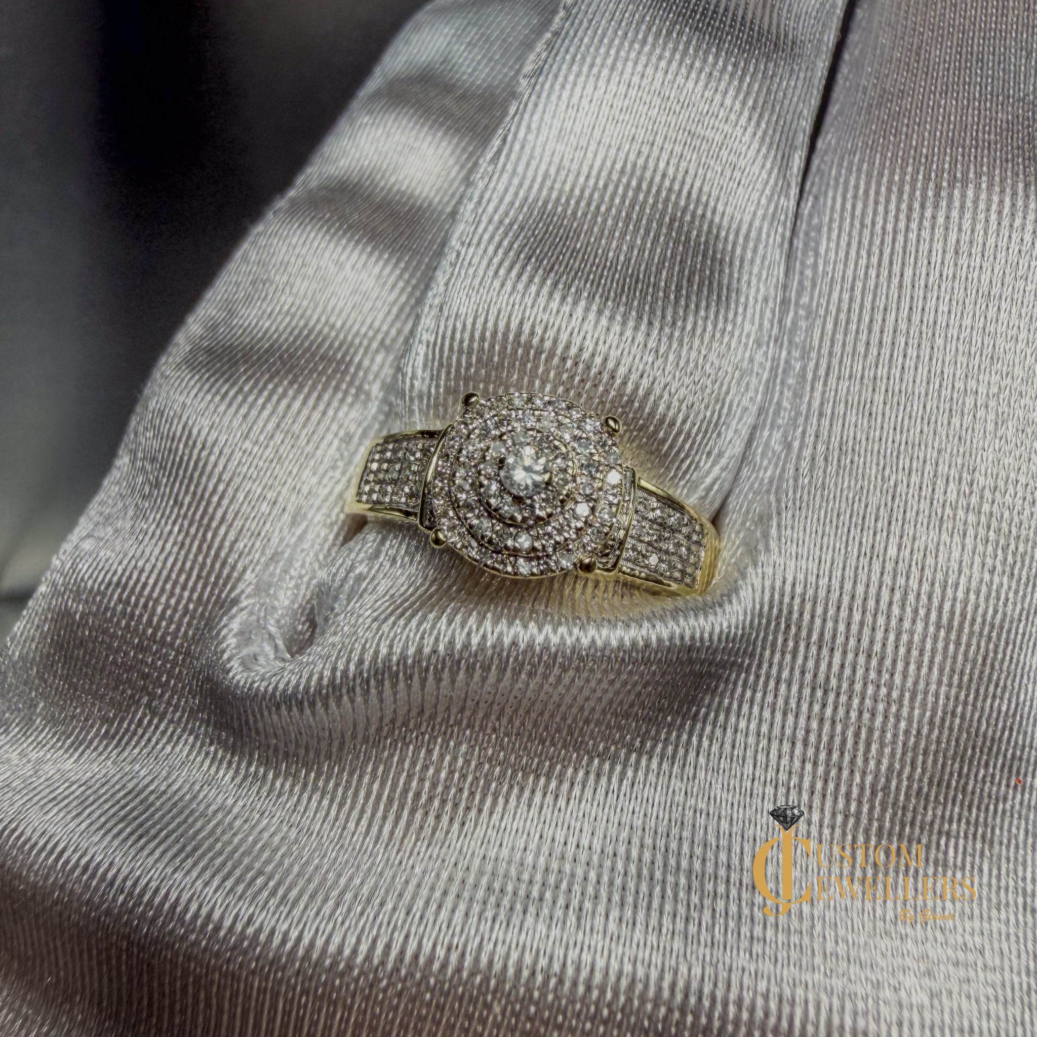 Hand assembled diamond custom cluster ring in 10k yellow gold with nearly 100 sparkling diamonds