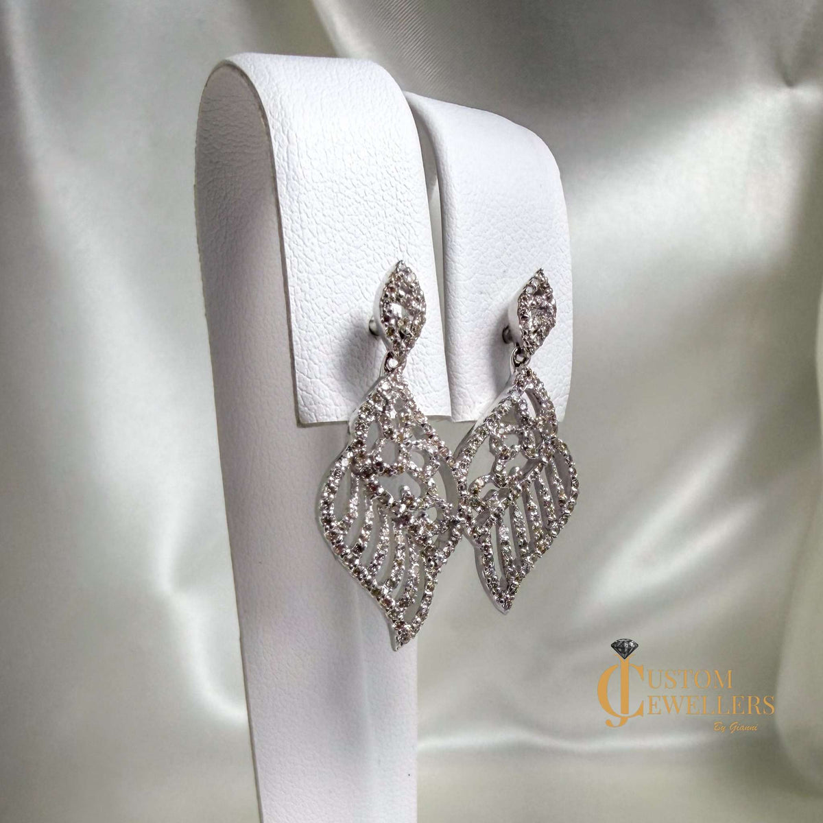 Angel Wing Earrings and Necklace featuring over 600 Natural Diamonds