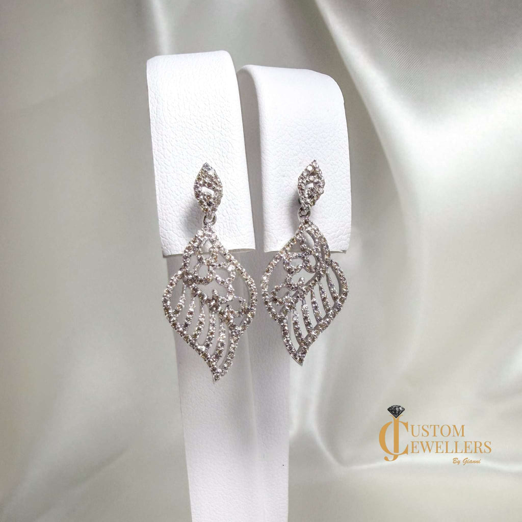 Angel Wing Earrings and Necklace featuring over 600 Natural Diamonds