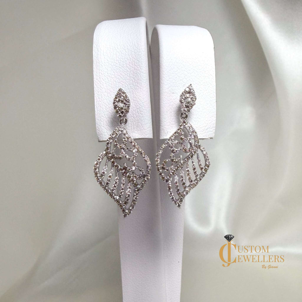 Angel Wing Earrings and Necklace featuring over 600 Natural Diamonds