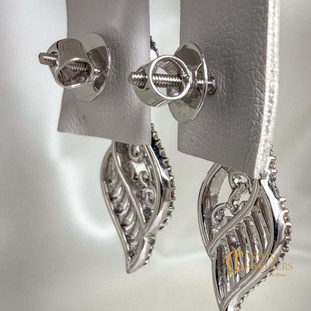 Angel Wing Earrings and Necklace featuring over 600 Natural Diamonds