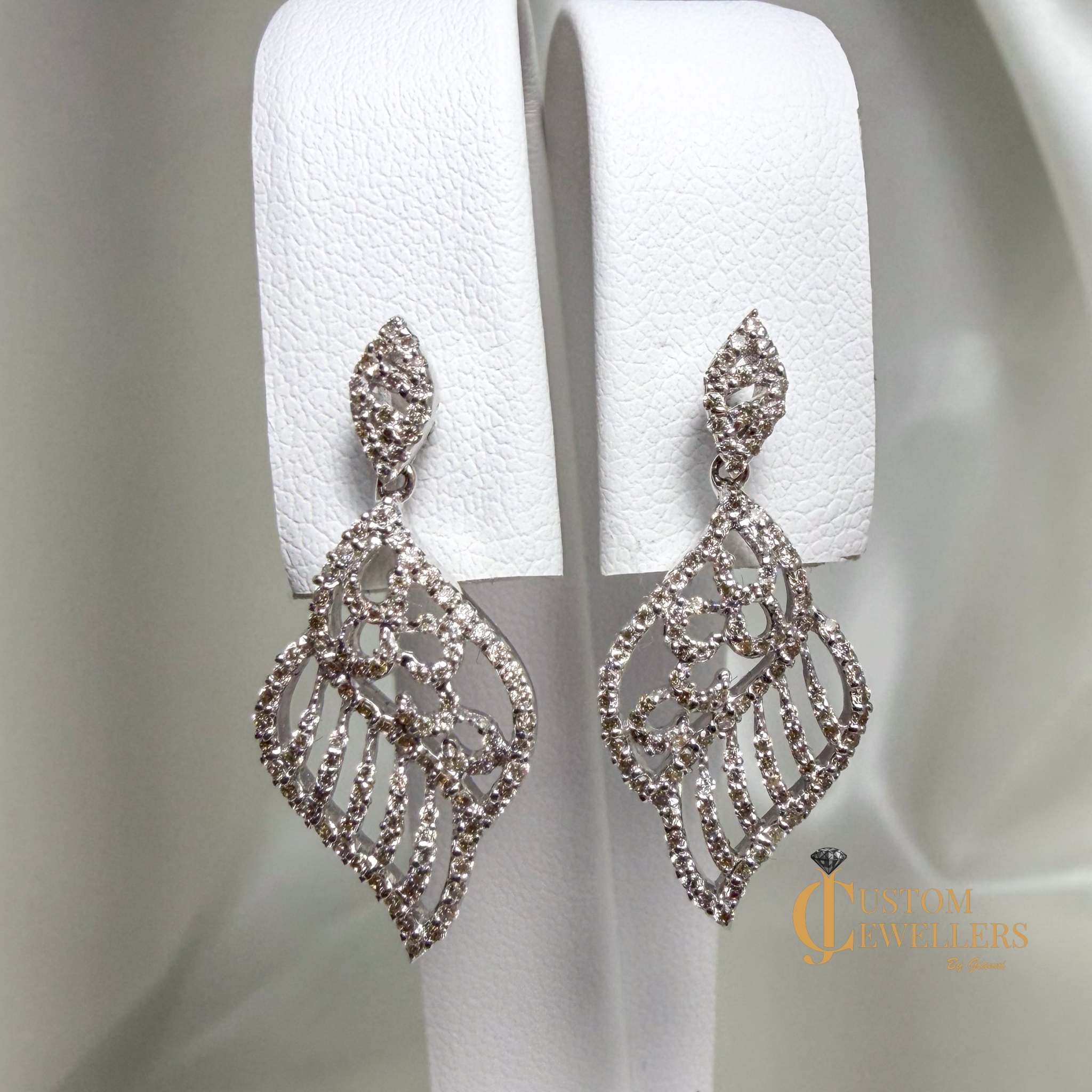 Angel Wing Earrings and Necklace featuring over 600 Natural Diamonds