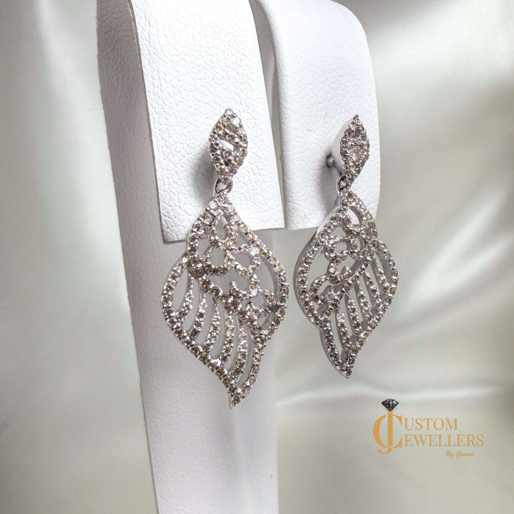 Angel Wing Earrings and Necklace featuring over 600 Natural Diamonds