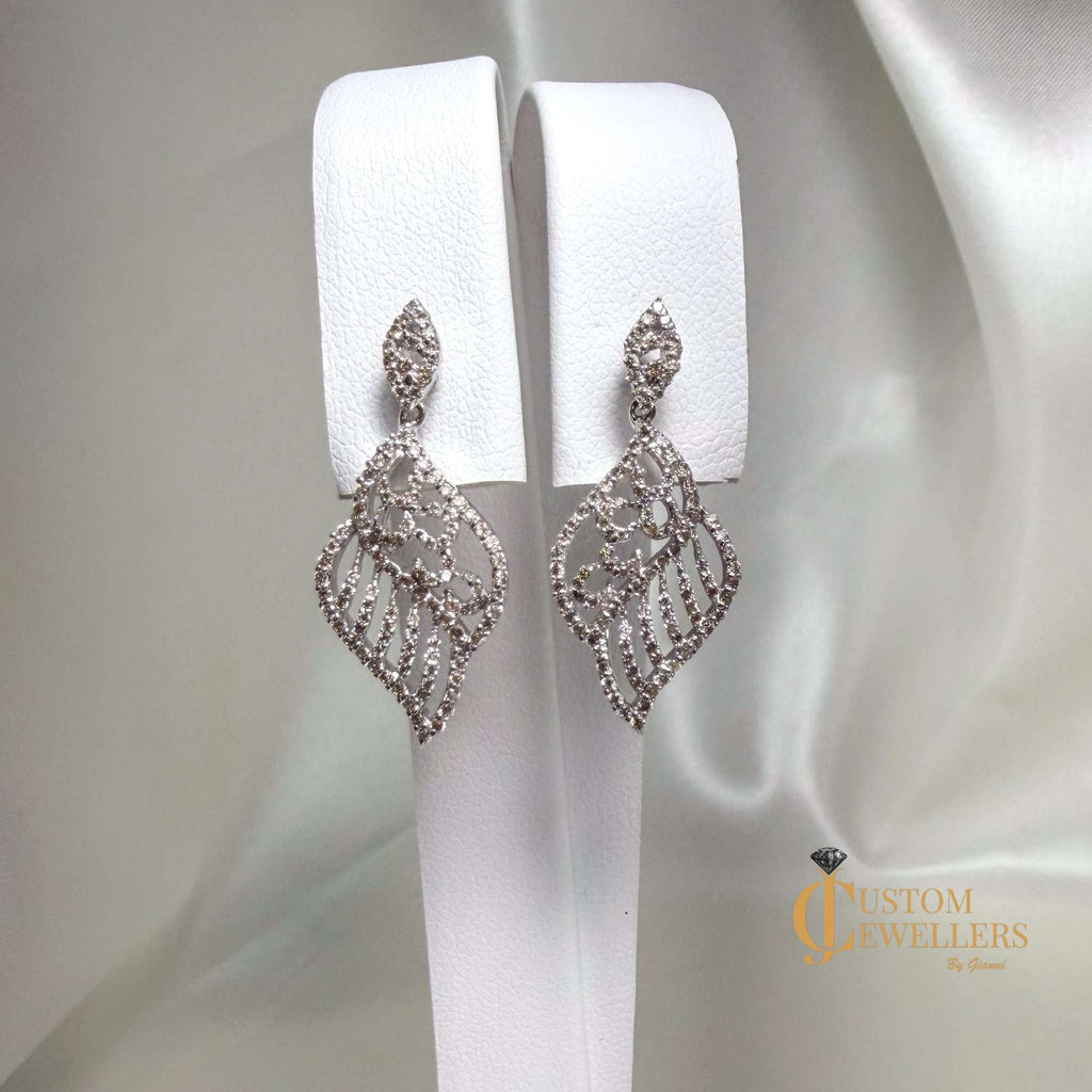 Angel Wing Earrings and Necklace featuring over 600 Natural Diamonds