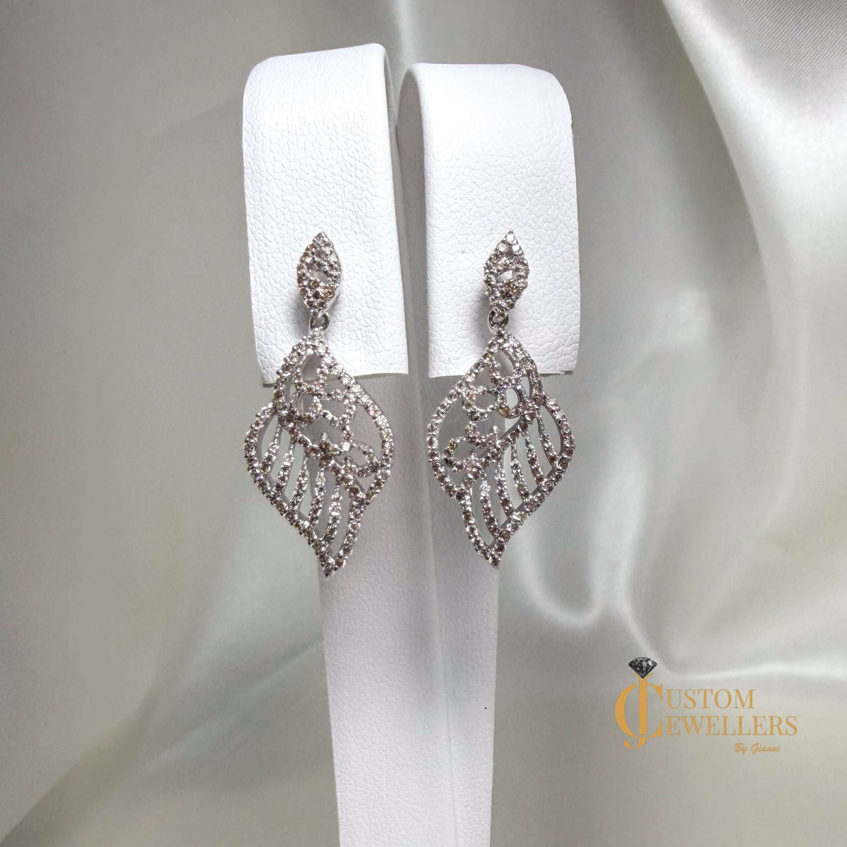 Angel Wing Earrings and Necklace featuring over 600 Natural Diamonds