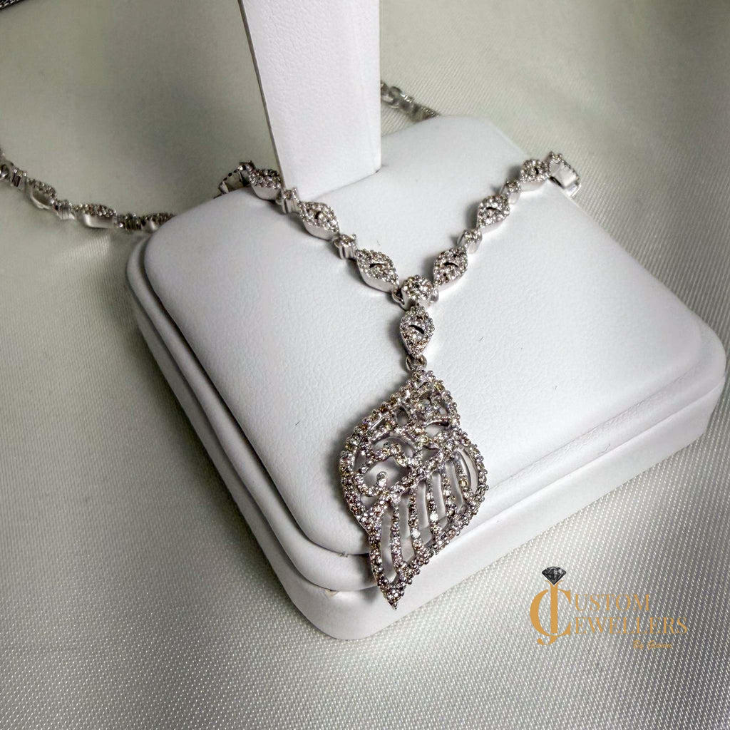Angel Wing Earrings and Necklace featuring over 600 Natural Diamonds