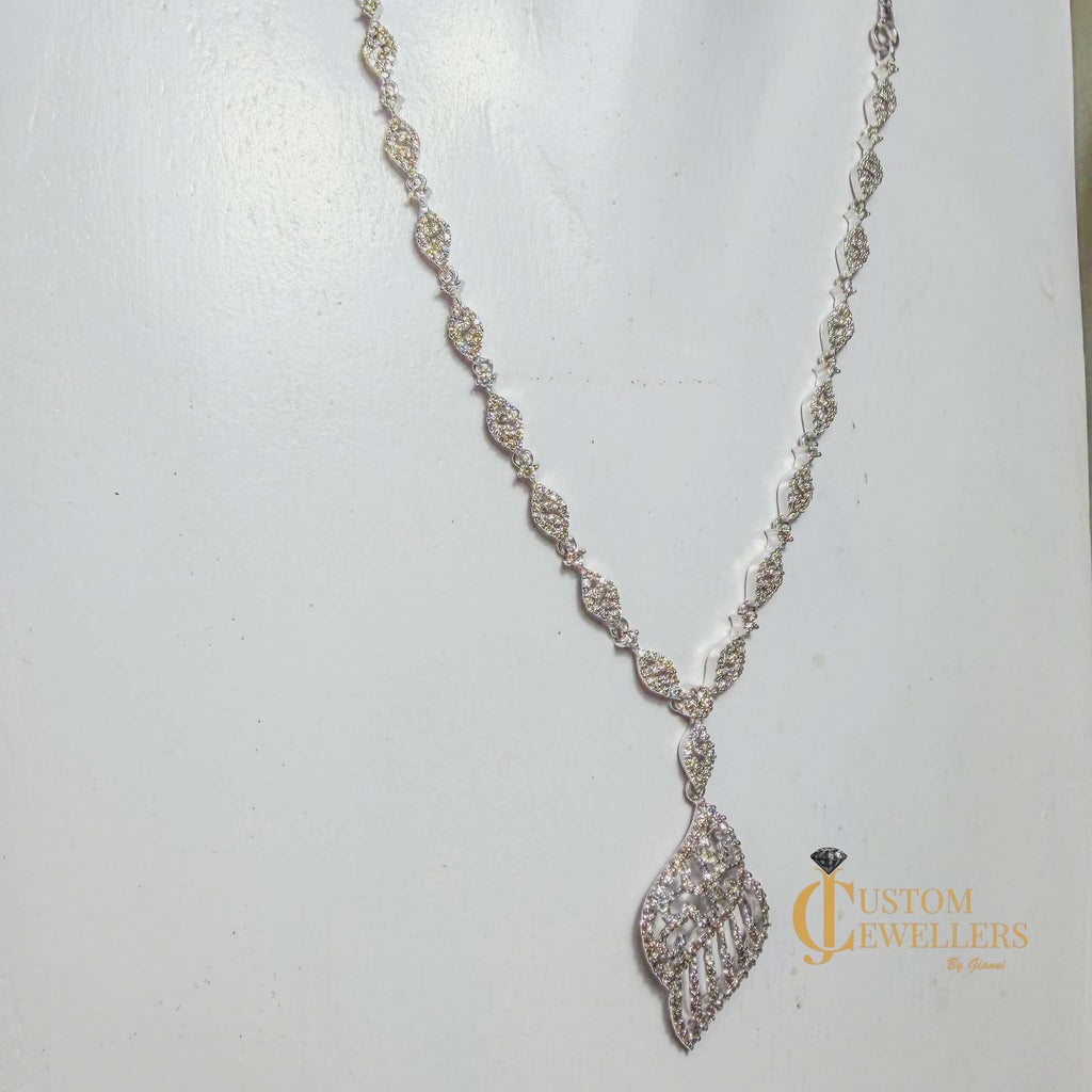 Angel Wing Earrings and Necklace featuring over 600 Natural Diamonds