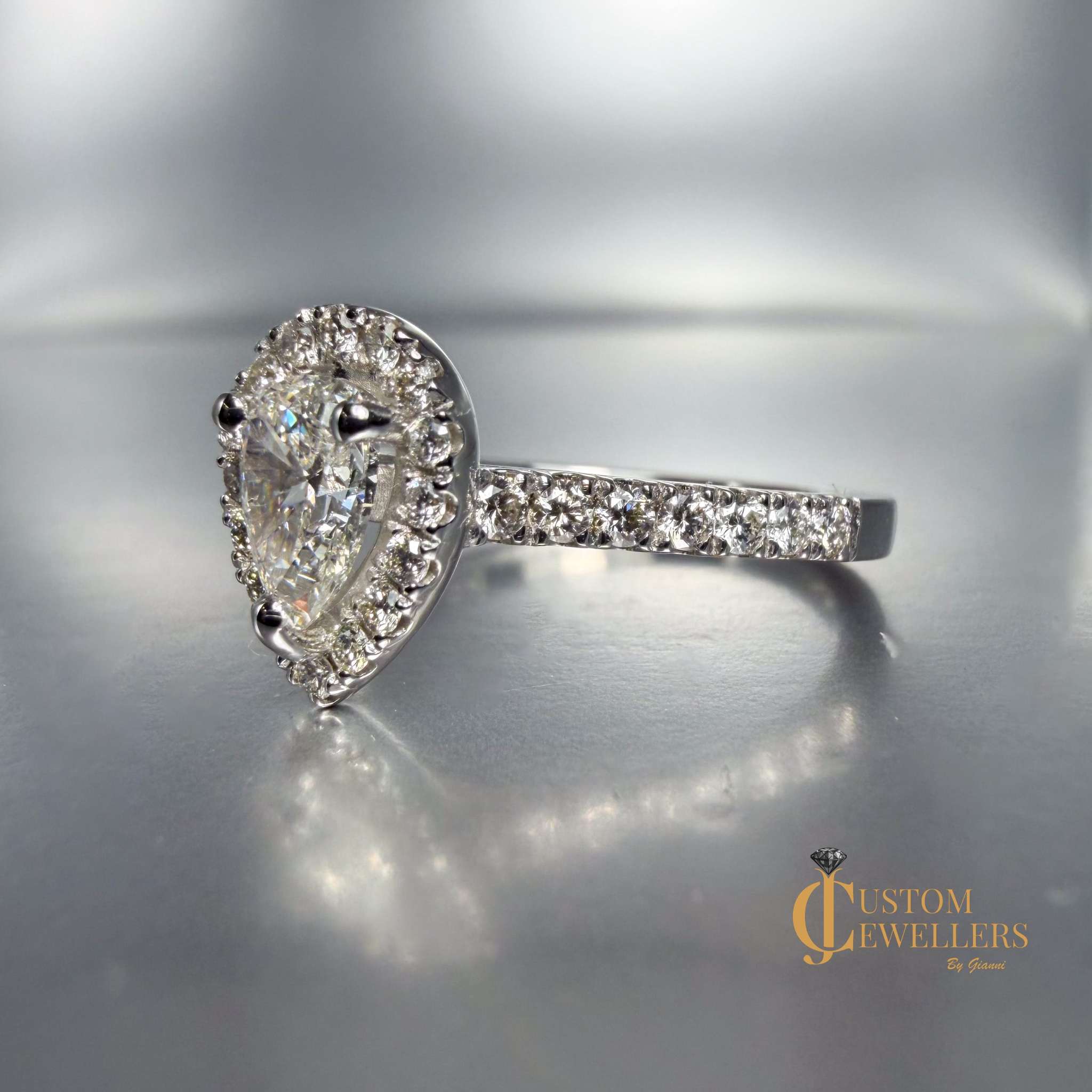 Designer Halo Pear Engagement Ring in 14k White Gold