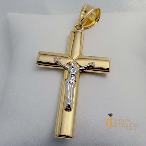 10kt yellow gold Jesus on the cross pendant with white gold figure and bright polish finish