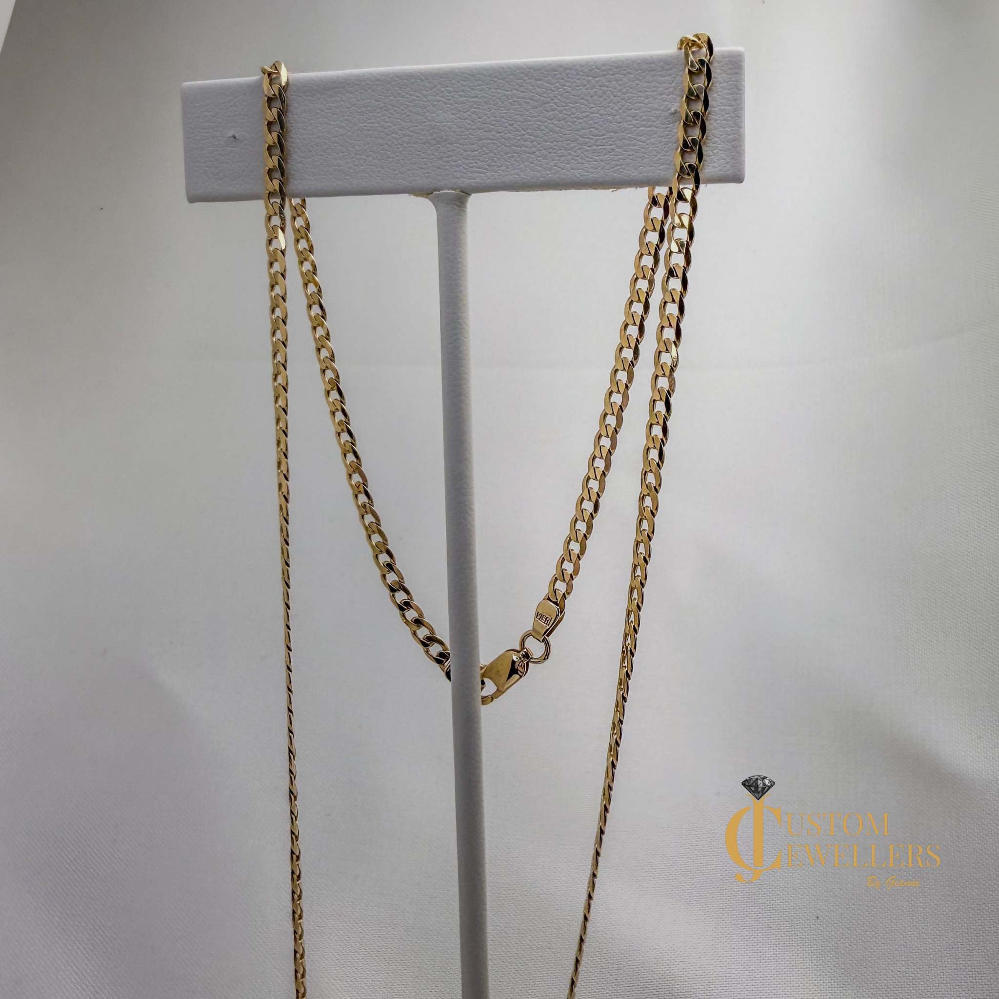 10kt yellow gold 20 inch Cuban link chain with bright polish finish