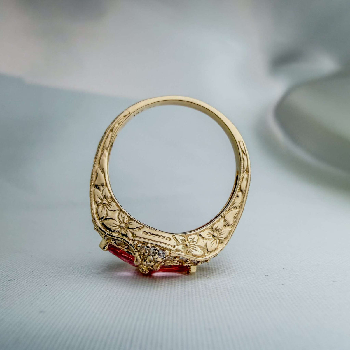 Extremely Rare Padparadscha Sapphires and White Sapphires in an Ornate Hand-Engraved Gold Ring