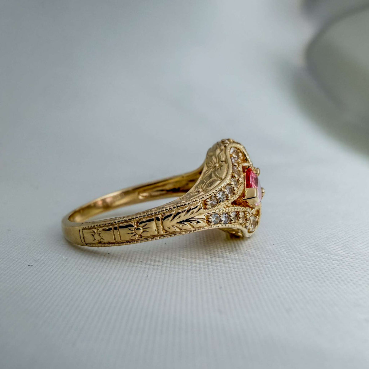 Extremely Rare Padparadscha Sapphires and White Sapphires in an Ornate Hand-Engraved Gold Ring