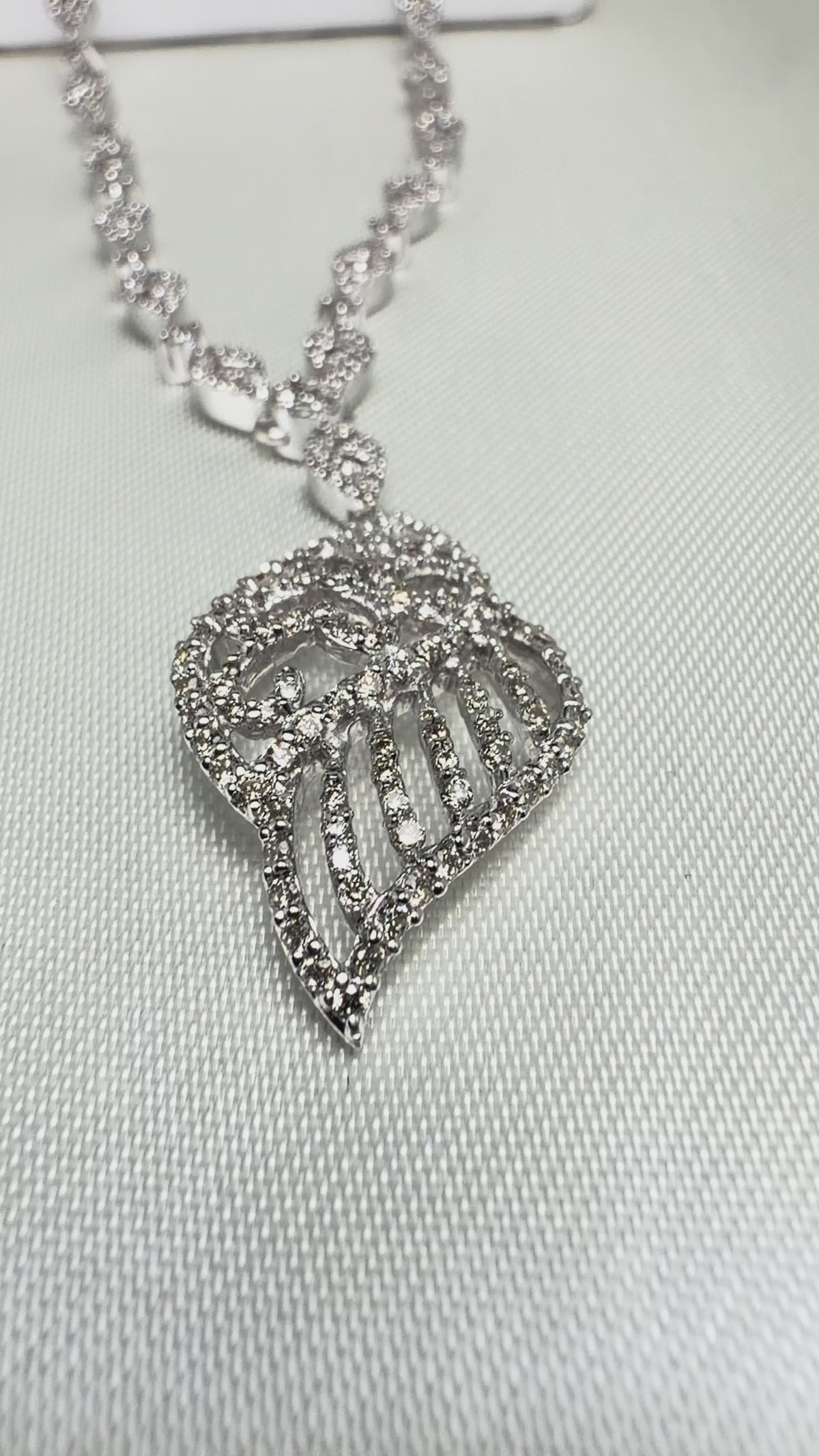 Angel Wing Earrings and Necklace featuring over 600 Natural Diamonds