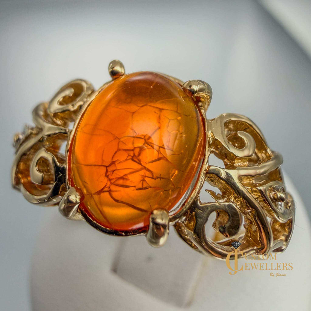 Rare and unique 14k yellow gold orange copal ring with diamonds