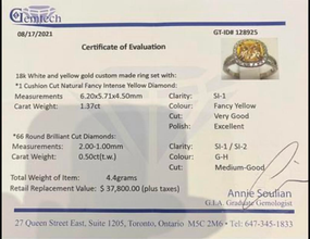 1.37 Carat Natural Yellow Center Diamond with .50 Shoulder Diamonds