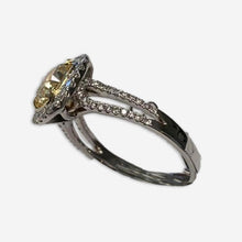 1.37 Carat Natural Yellow Center Diamond with .50 Shoulder Diamonds